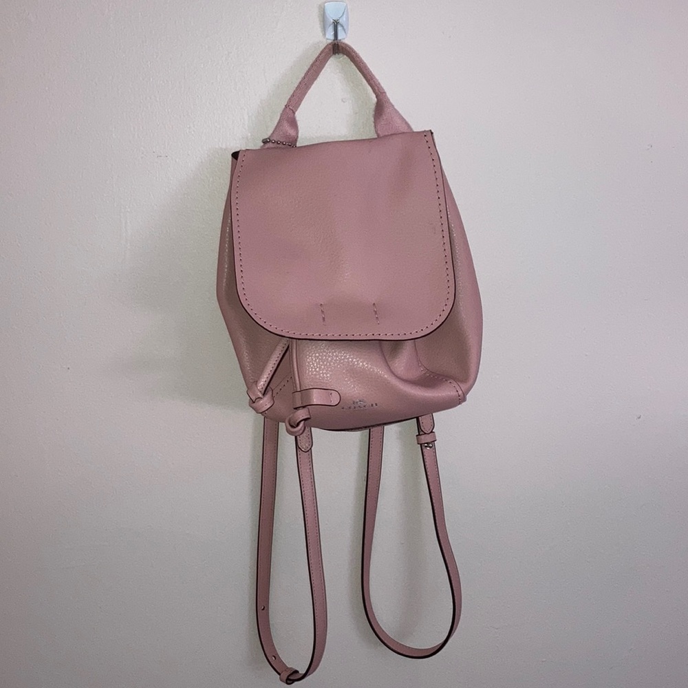 A pink coach bag